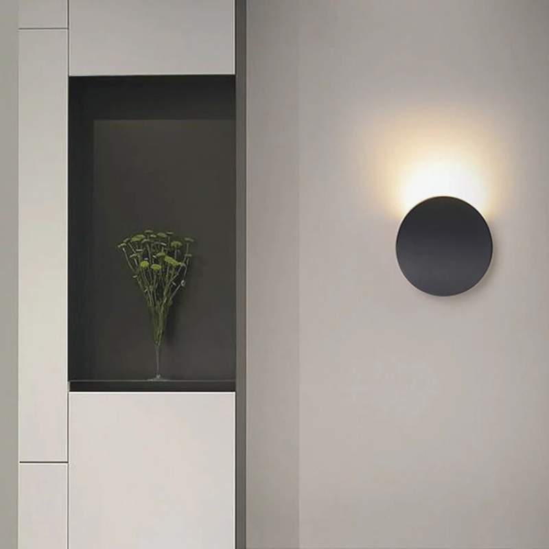 Minimalist Nordic Waterproof Aluminum Wall Sconce next to plant.