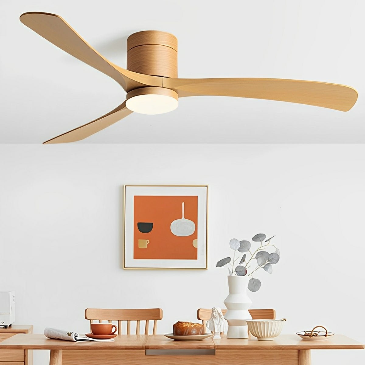 Arden Modern 6-Speed Reverse DC Ceiling Fan in a wood tone finish, featuring a light wood-toned body and three matching blades with an integrated PMMA light, installed in a contemporary dining room.