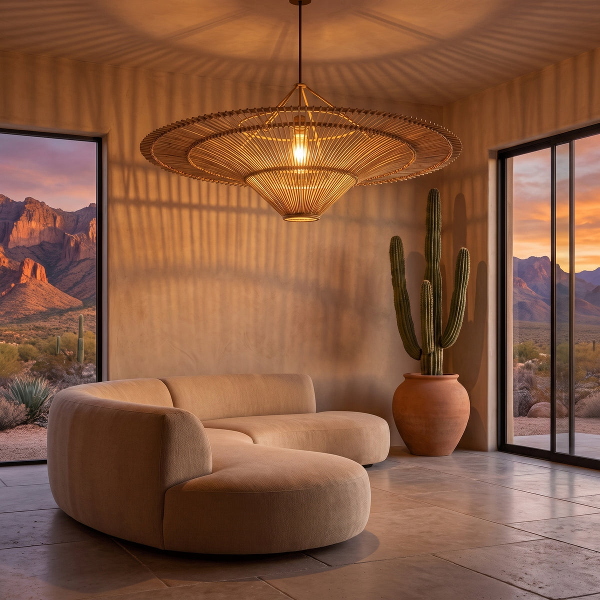 Oversized flat wicker pendant lamp shade in a desert modern great room