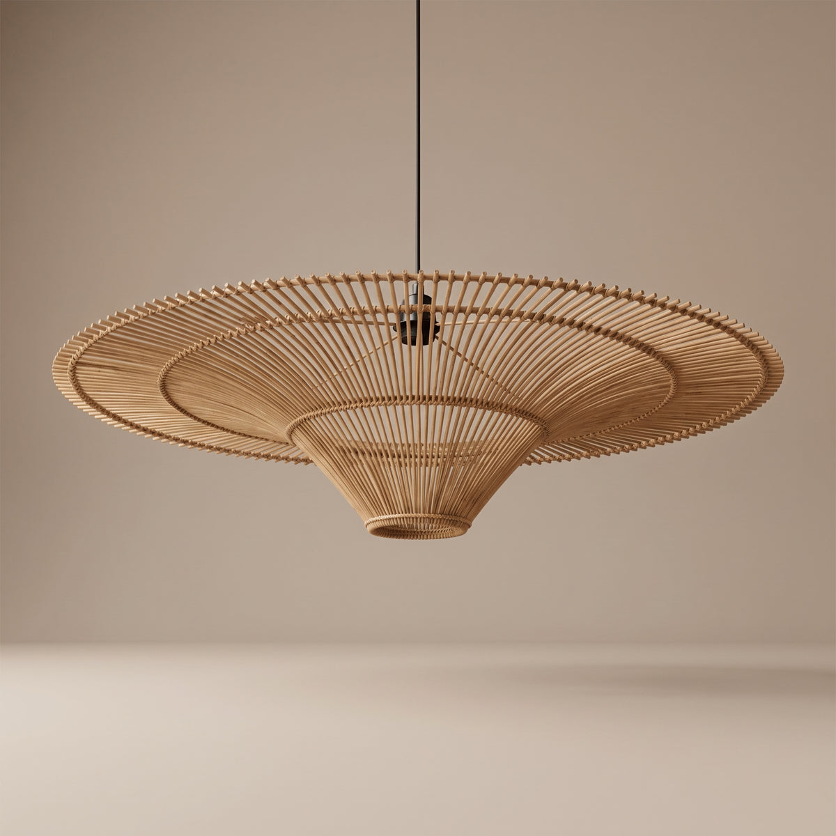 Oversized flat wicker pendant lamp shade unlit, view of the underside