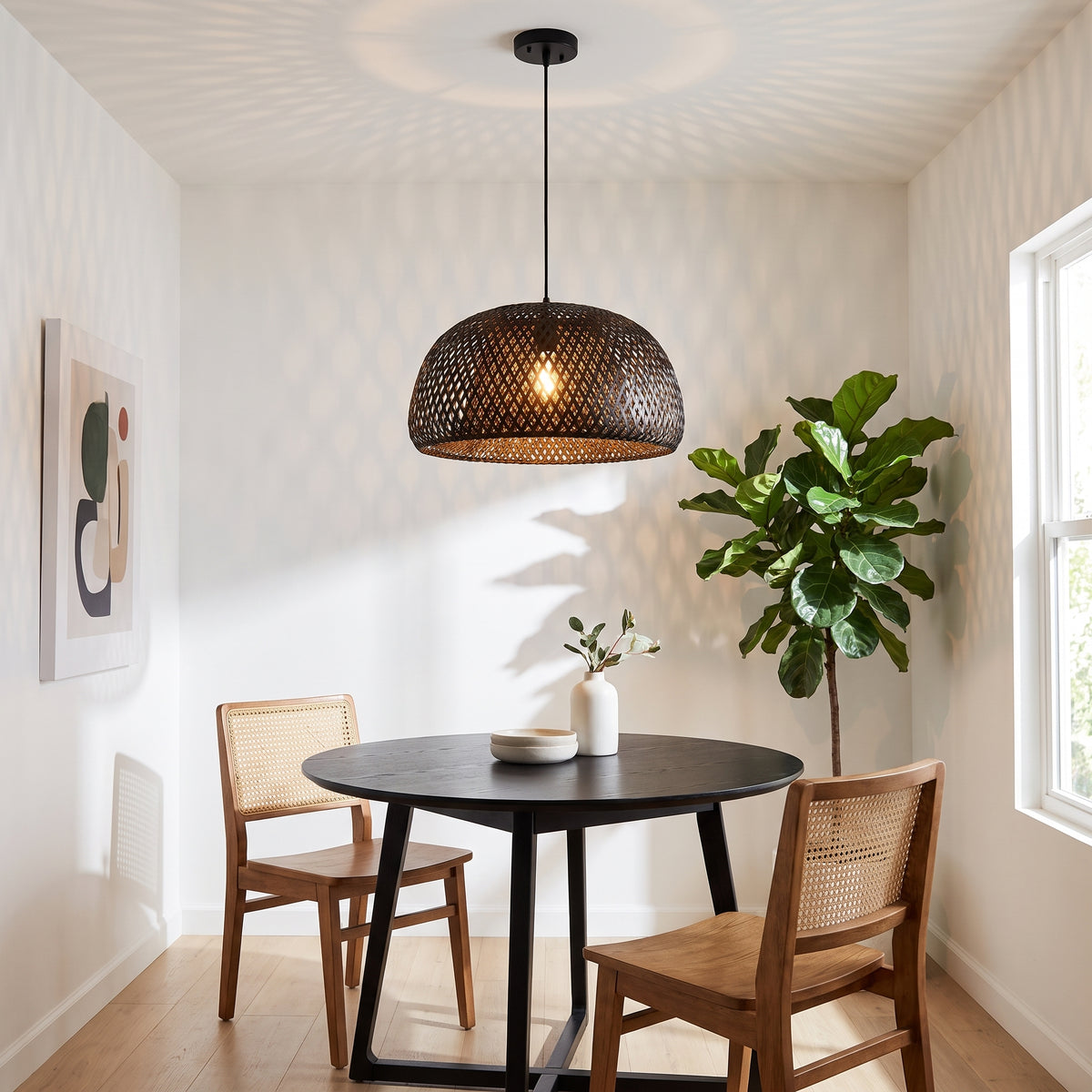 Matte black bamboo dome pendant lamp shade above a dining nook