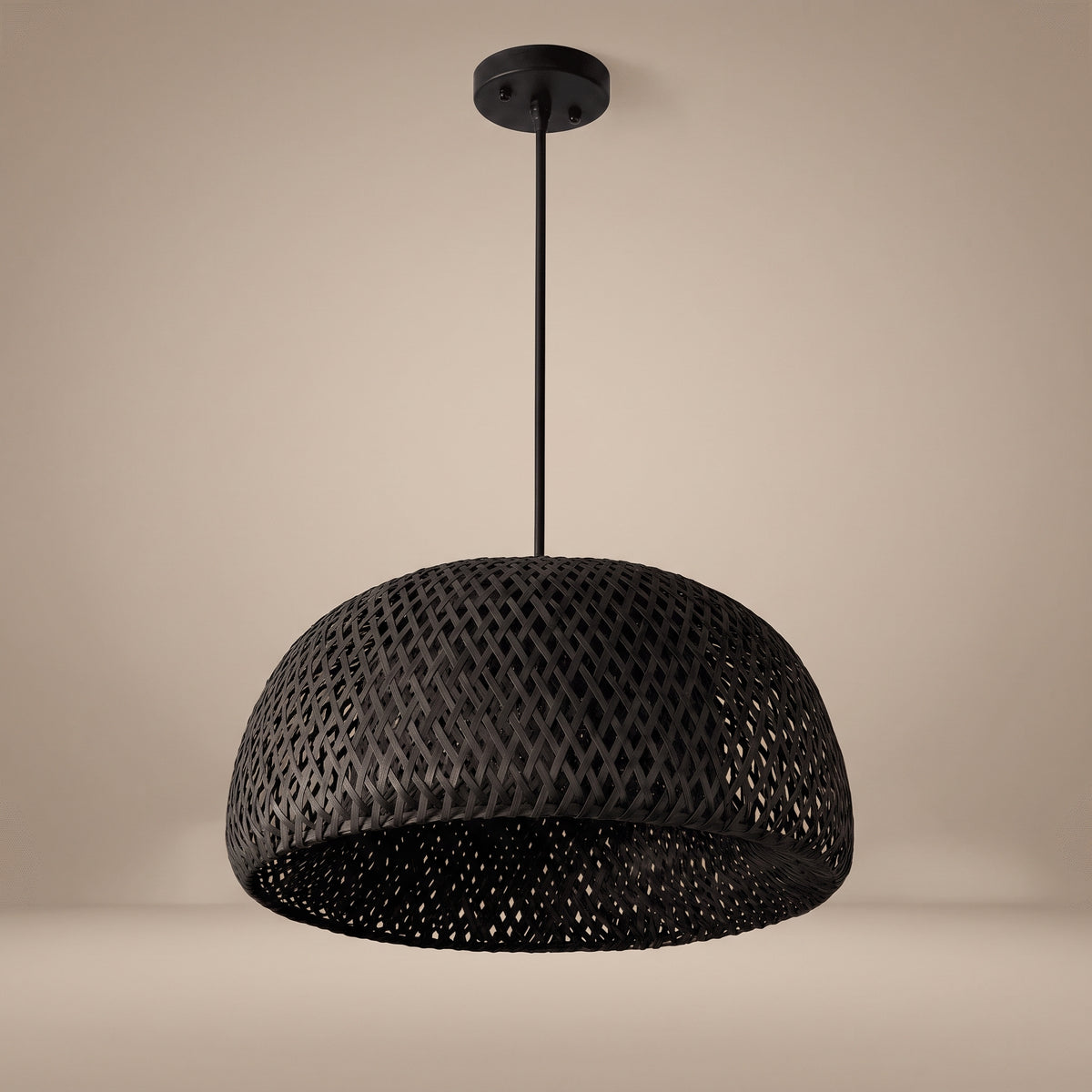 Bamboo dome pendant lamp shade in matte black finish on a beige studio background