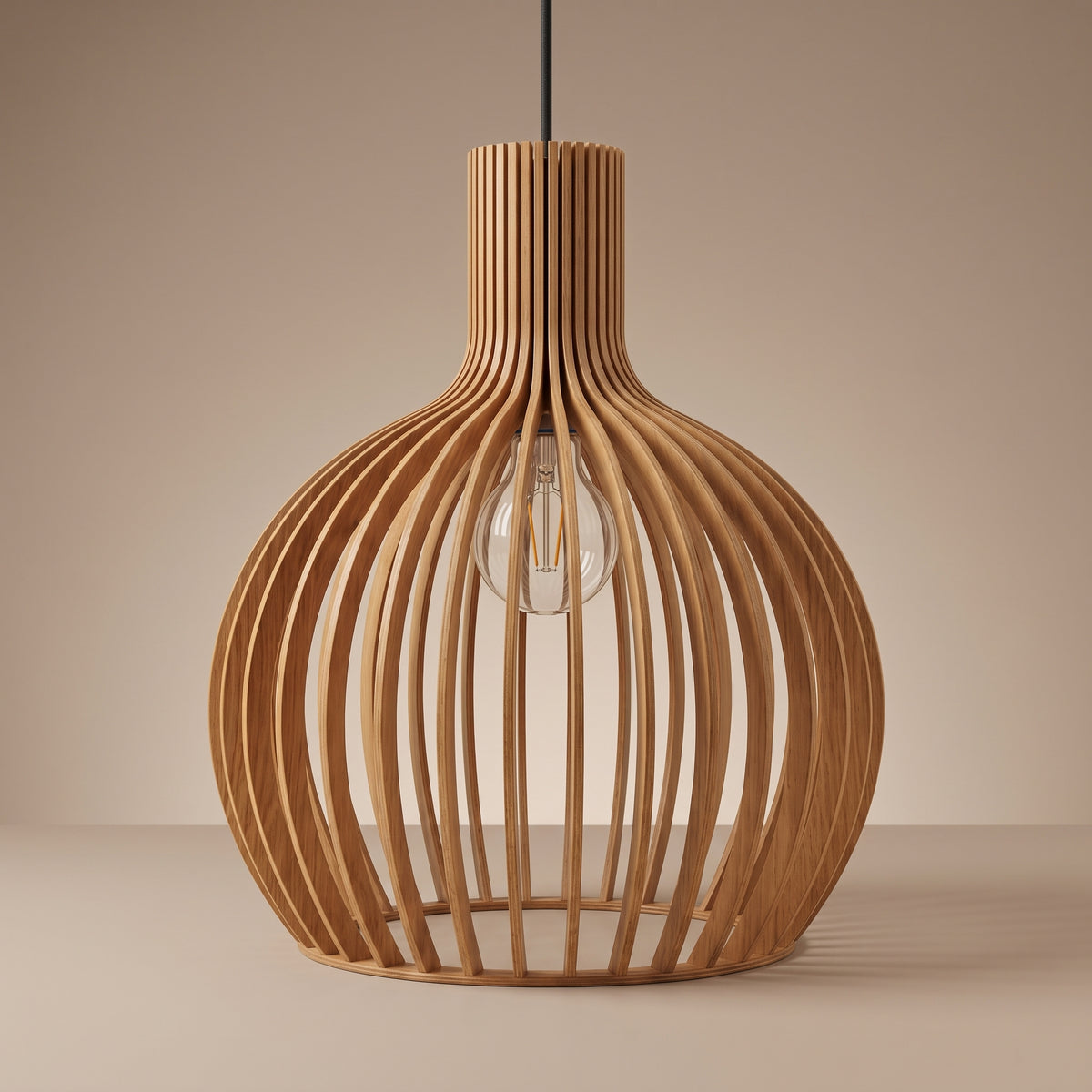 Wooden slat cage pendant lamp shade unlit on a beige studio background