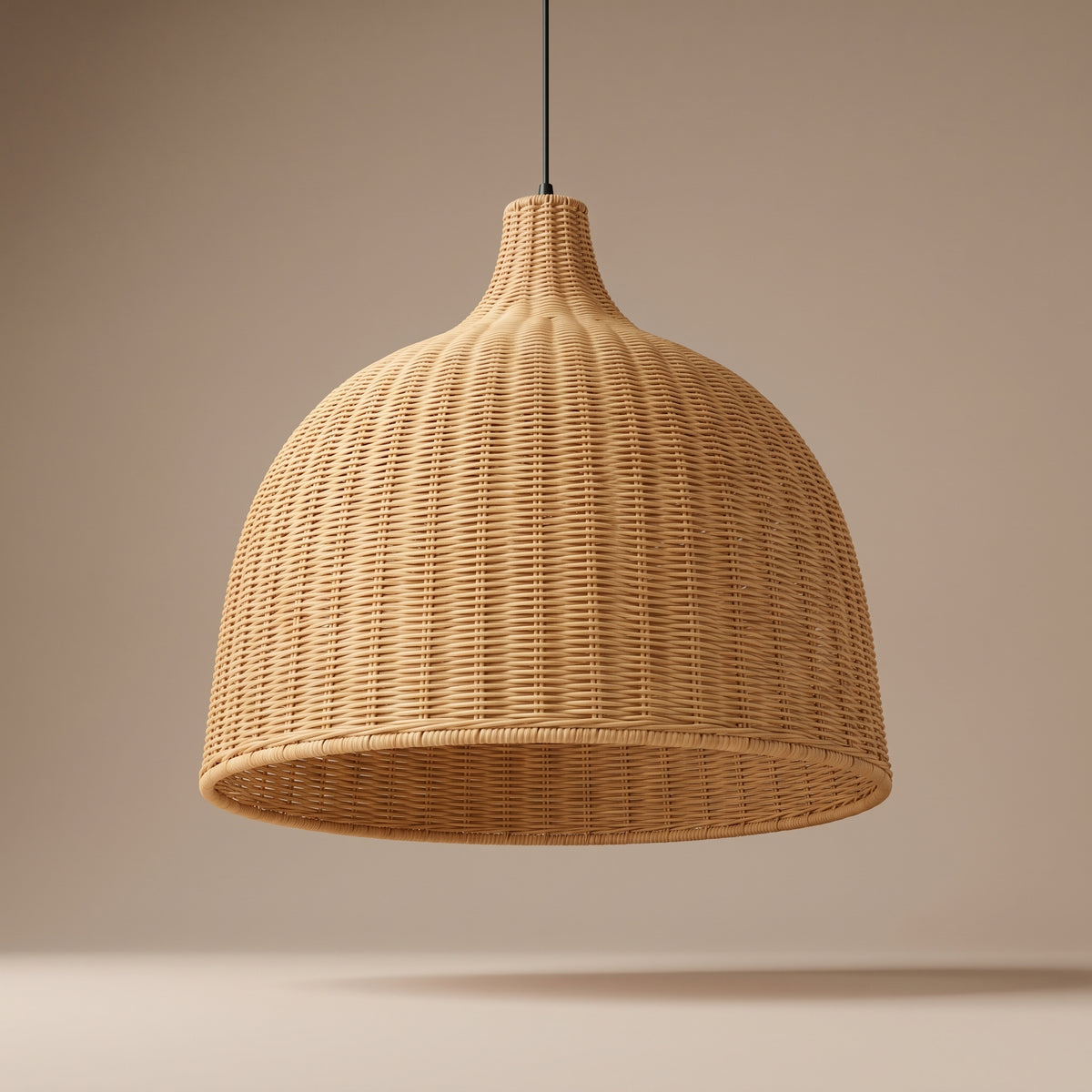 Wicker bell pendant lamp shade unlit, three-quarter view showing the open bottom
