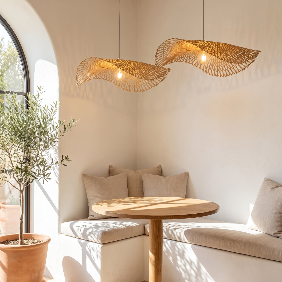 Bamboo cone pendant lamp shade above a California breakfast nook