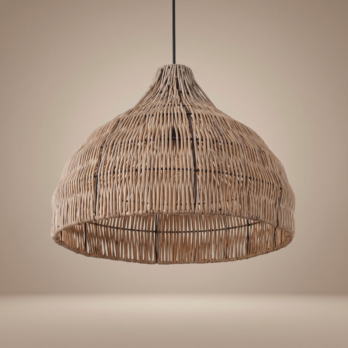 Weathered wicker pendant lamp shade unlit, three-quarter view showing the natural texture