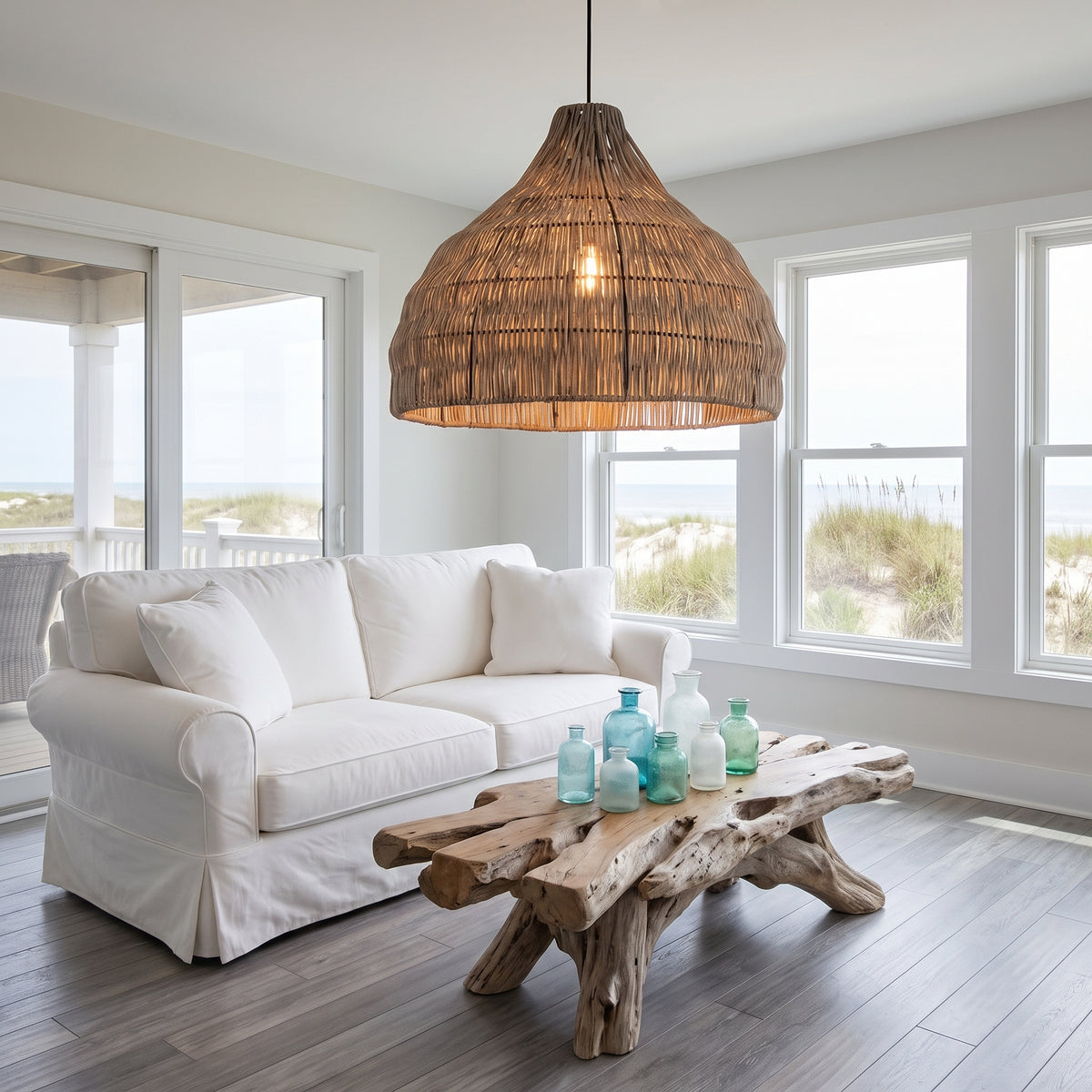 Weathered wicker pendant lamp shade in an Outer Banks beach house living room
