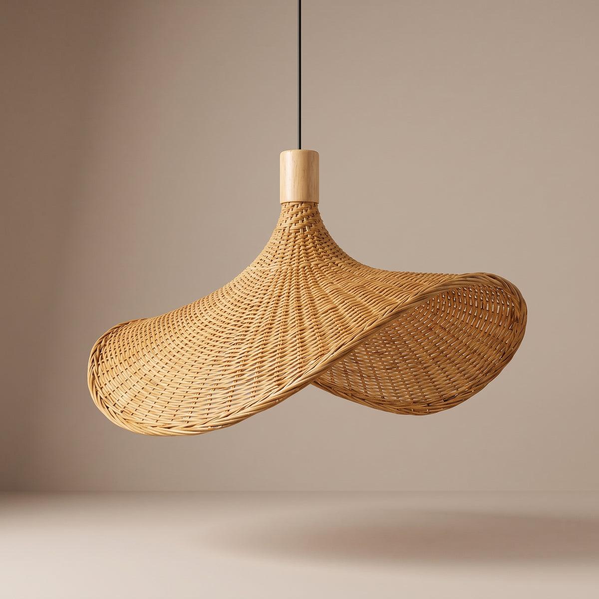 Asymmetric wicker pendant lamp shade unlit, three-quarter view showing the natural texture