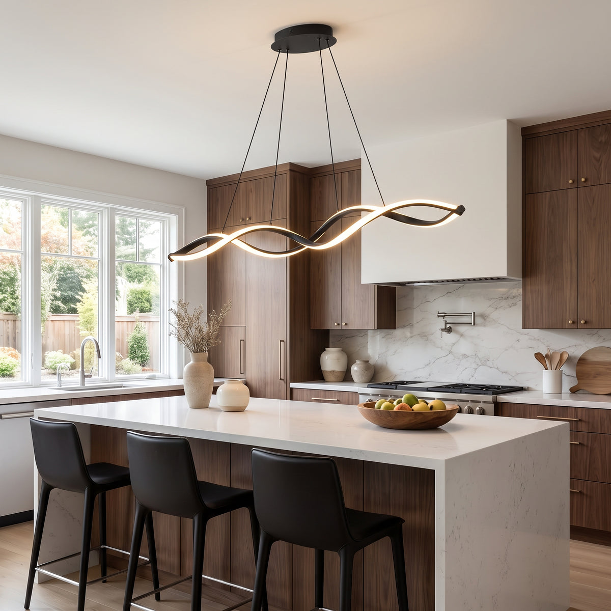 Ondine wave linear LED pendant above a kitchen island