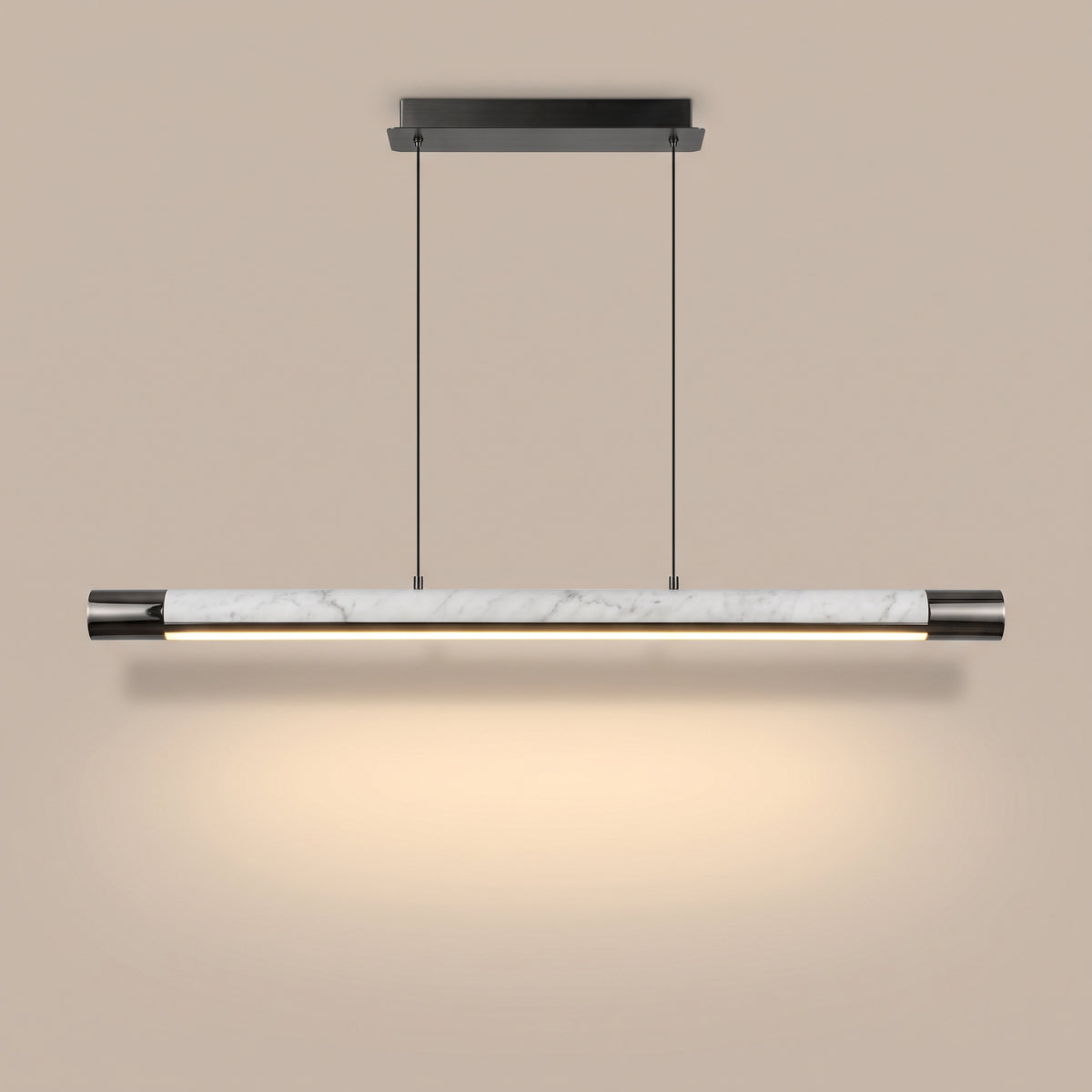 Carrara Line marble linear pendant, lit, studio view