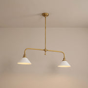 Ashbury brass 2-light linear pendant with white shades, lit, studio view