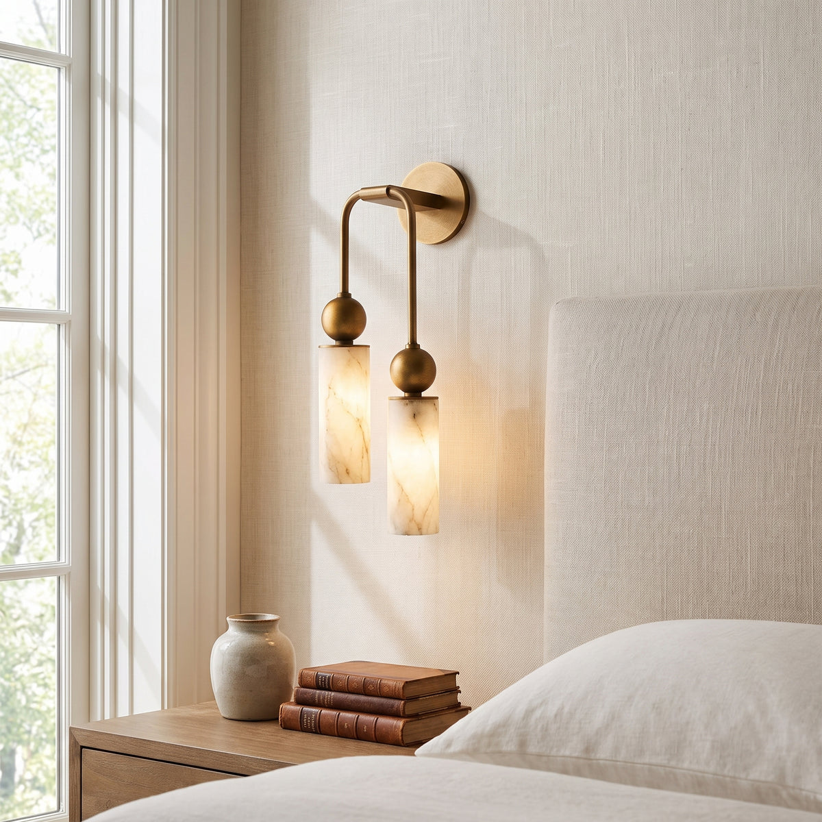 Alba alabaster wall sconce as a bedside light in a bedroom