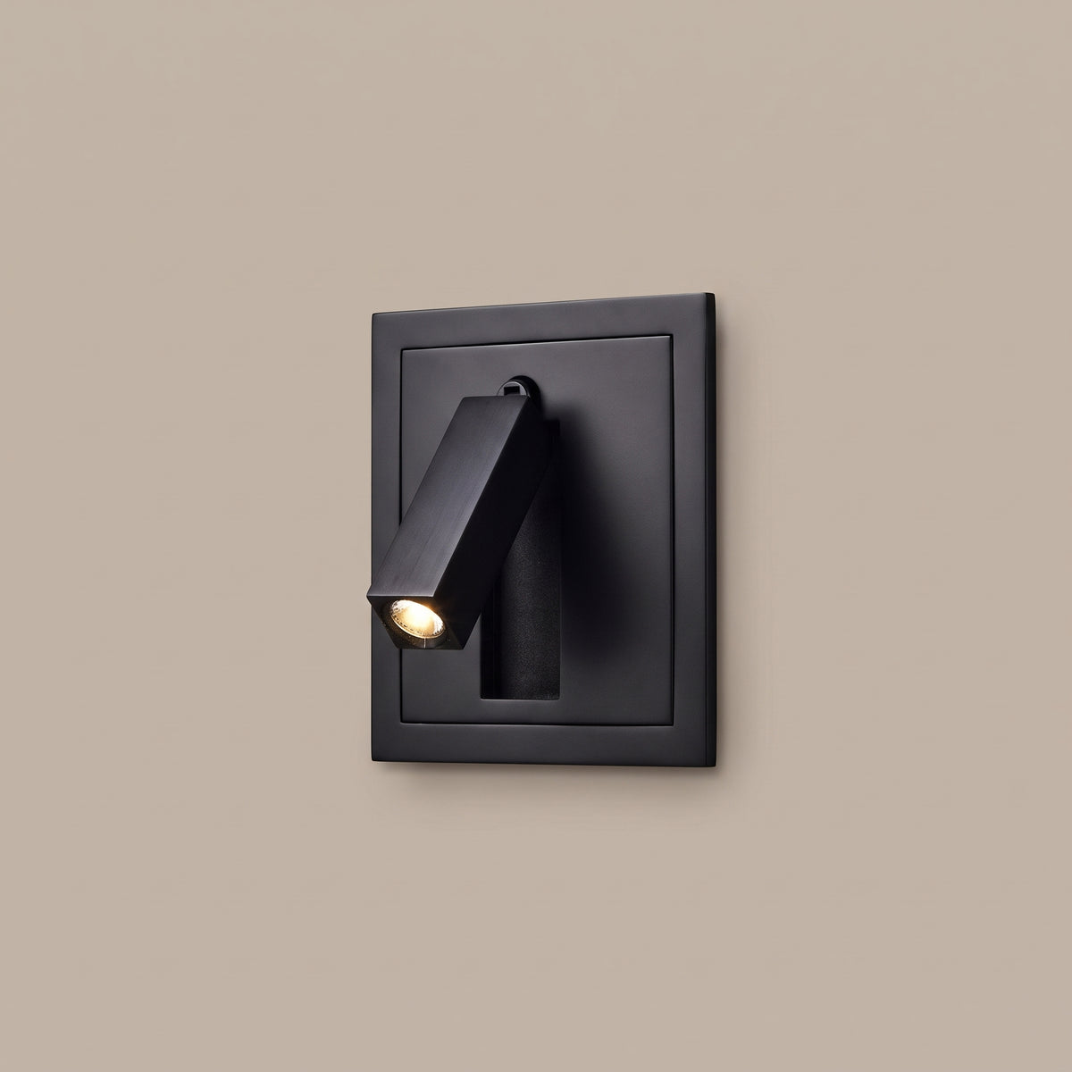 Nook recessed fold-out bedside reading light in matte black, lit, studio view