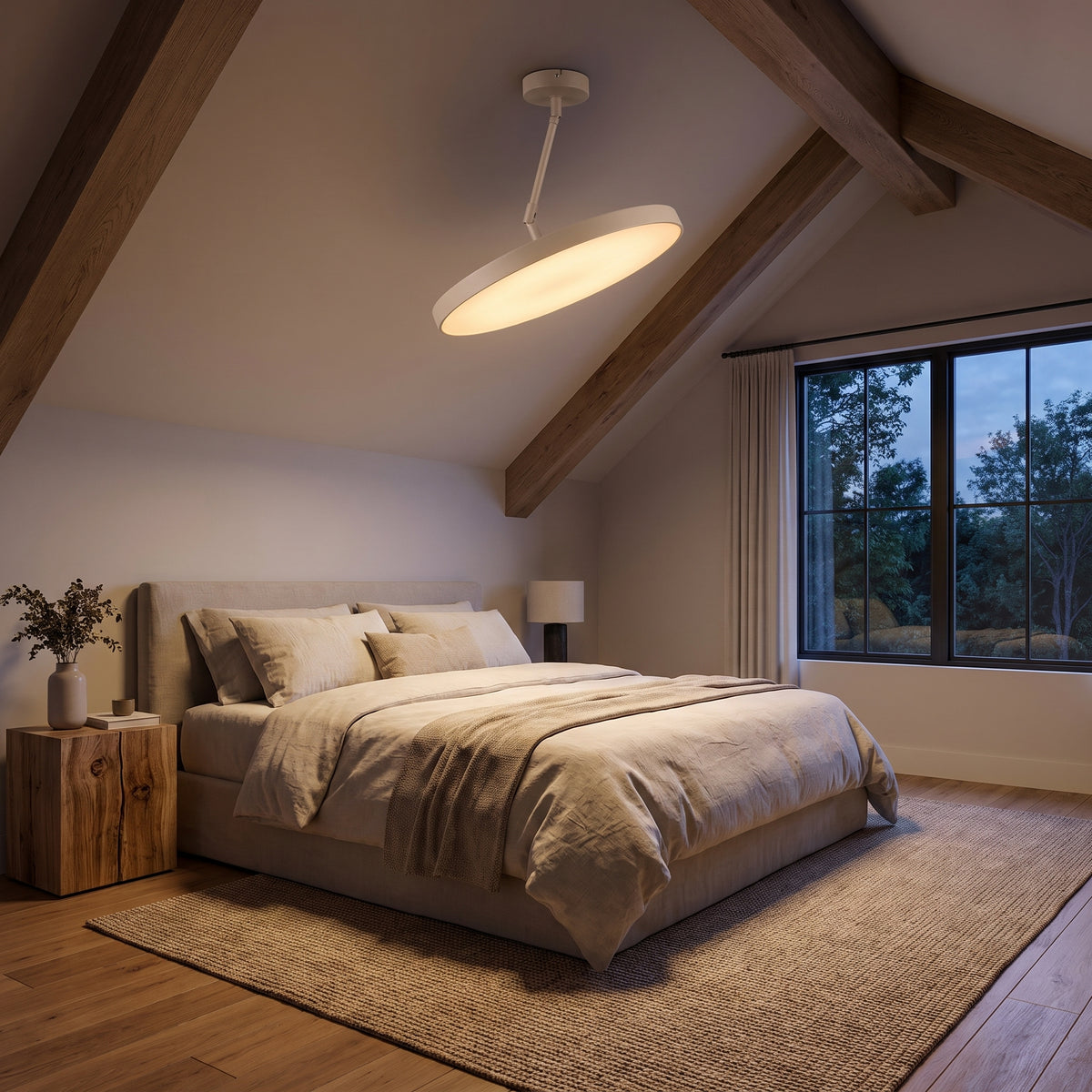 Sway disc ceiling light on a sloped bedroom ceiling