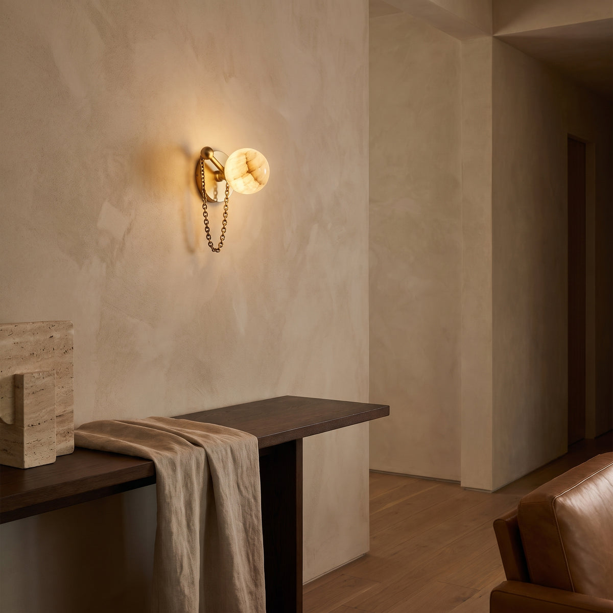 Collier wall sconce in a hallway