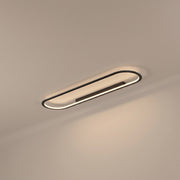 Ovalis oval LED flush mount ceiling light - studio photo, light on