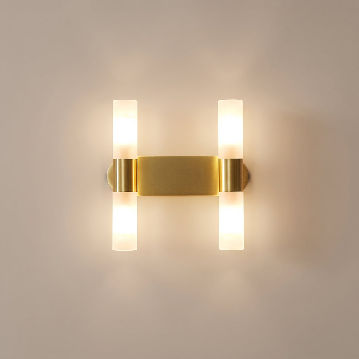 Tubo gold tube wall sconce - studio photo, light on