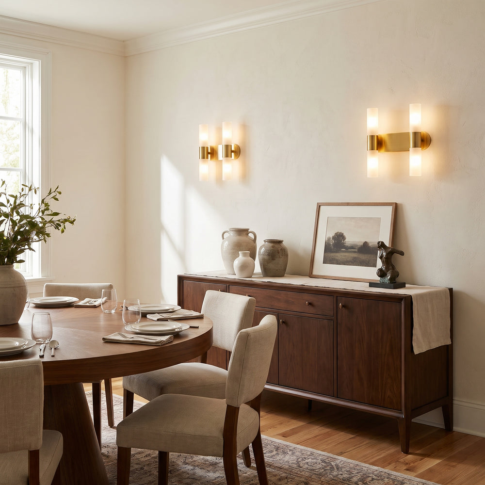 A pair of walnut sconces above a bed