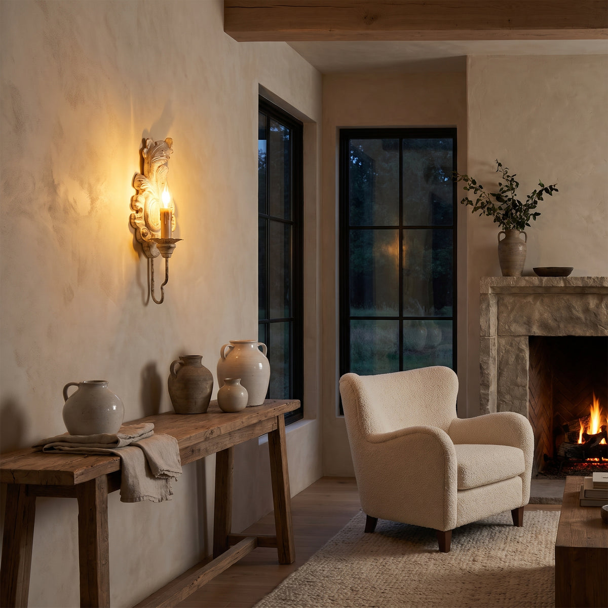 Acanthe French country carved candle wall sconce in a living space