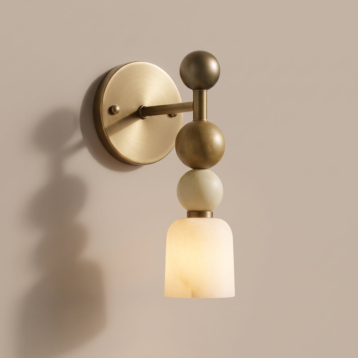 Totem stacked alabaster and marble wall sconce