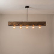 Poutre wood beam island chandelier - studio photo, light on