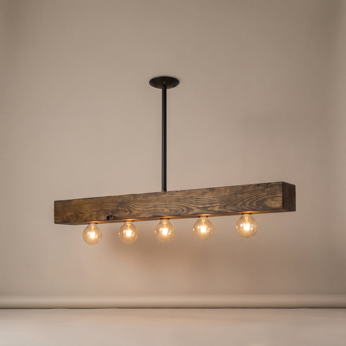 Poutre wood beam island chandelier - studio photo, light on