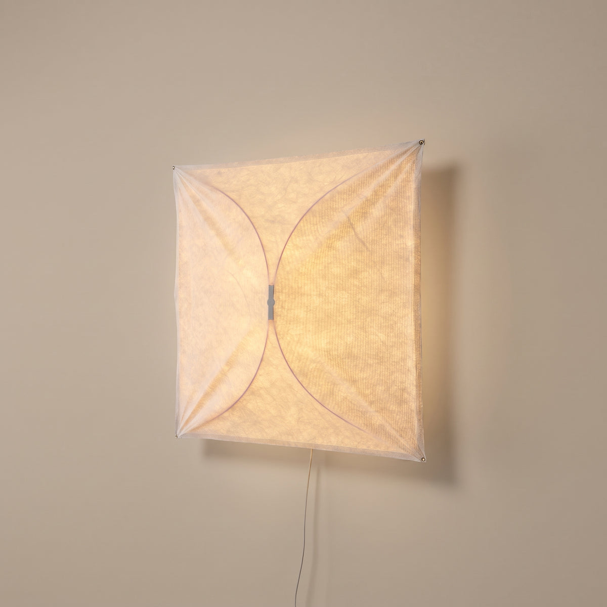 Origami square paper plug-in wall light - studio photo, light on