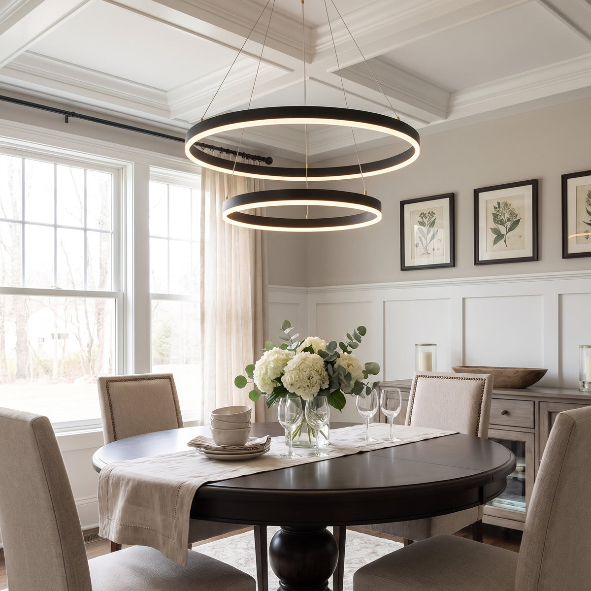 Orbites multi-ring LED pendant light in a dining room