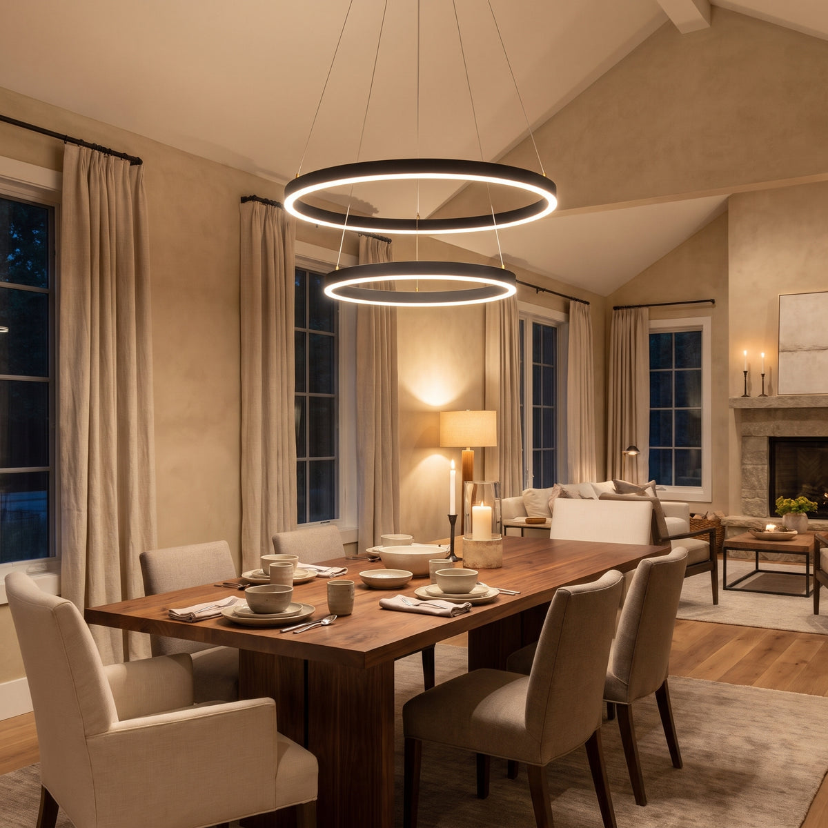 Orbites multi-ring LED pendant light over a dining table