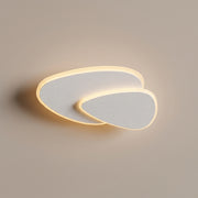 Delta triangle LED flush mount ceiling light - studio photo, light on