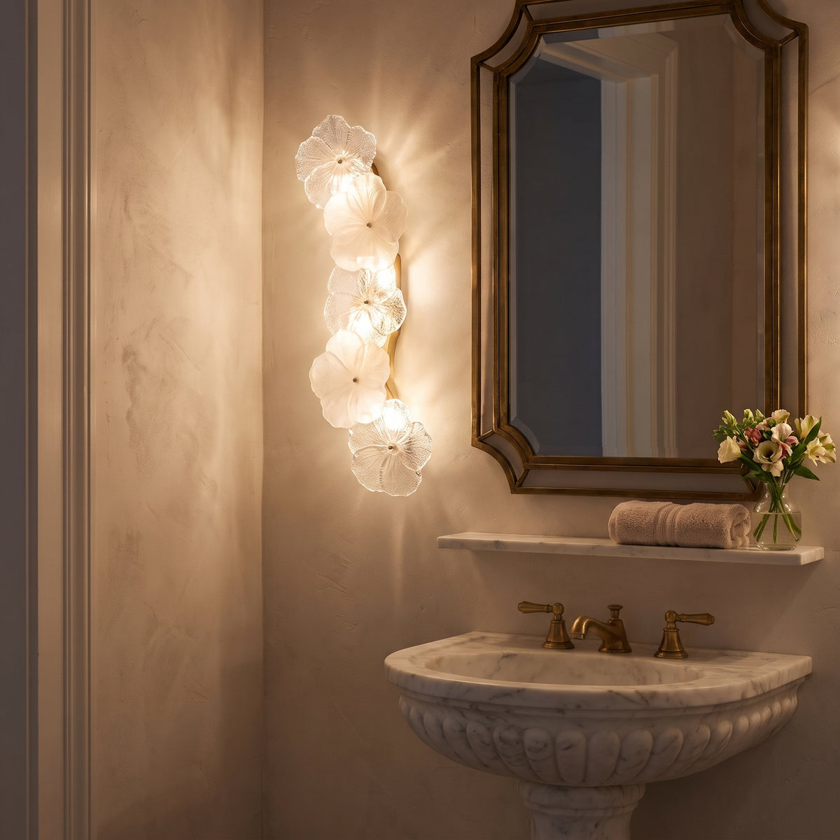 Fleuron floral glass sconce in a powder room