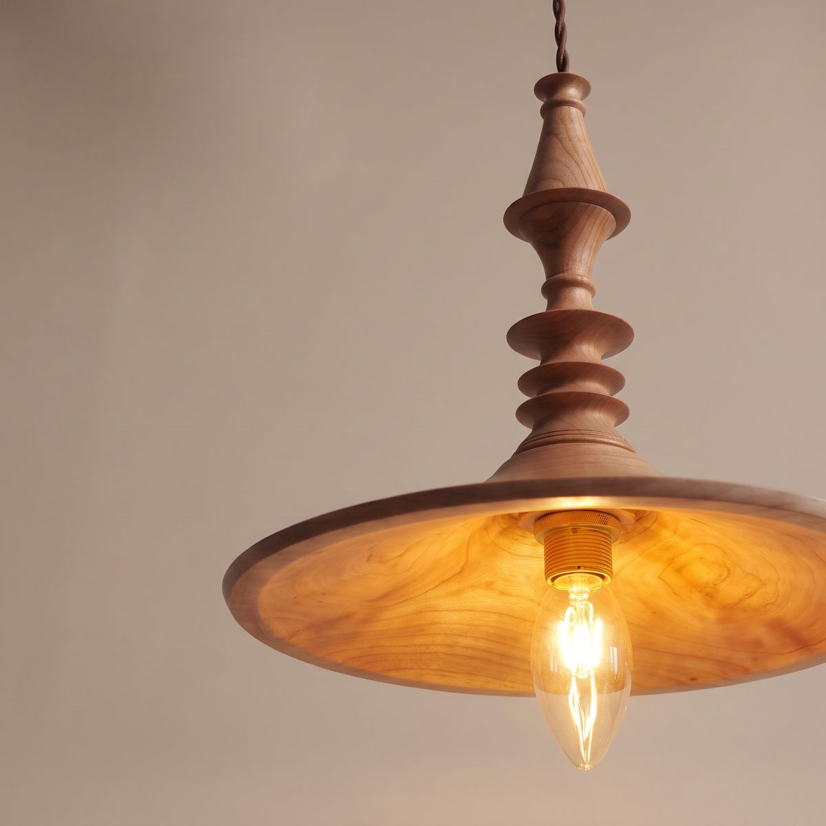 Toupie turned wood pendant light, wood grain detail