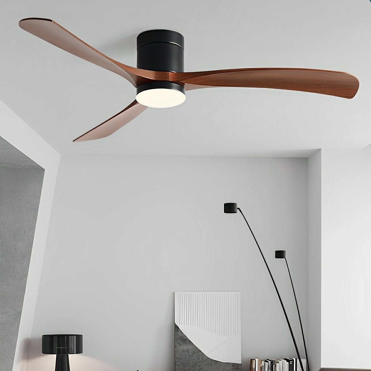 Arden Modern 6-Speed Reverse DC Ceiling Fan Copper with PMMA Light Finish, black ceiling fan with three wood tone blades and an integrated light, installed in a modern living room.