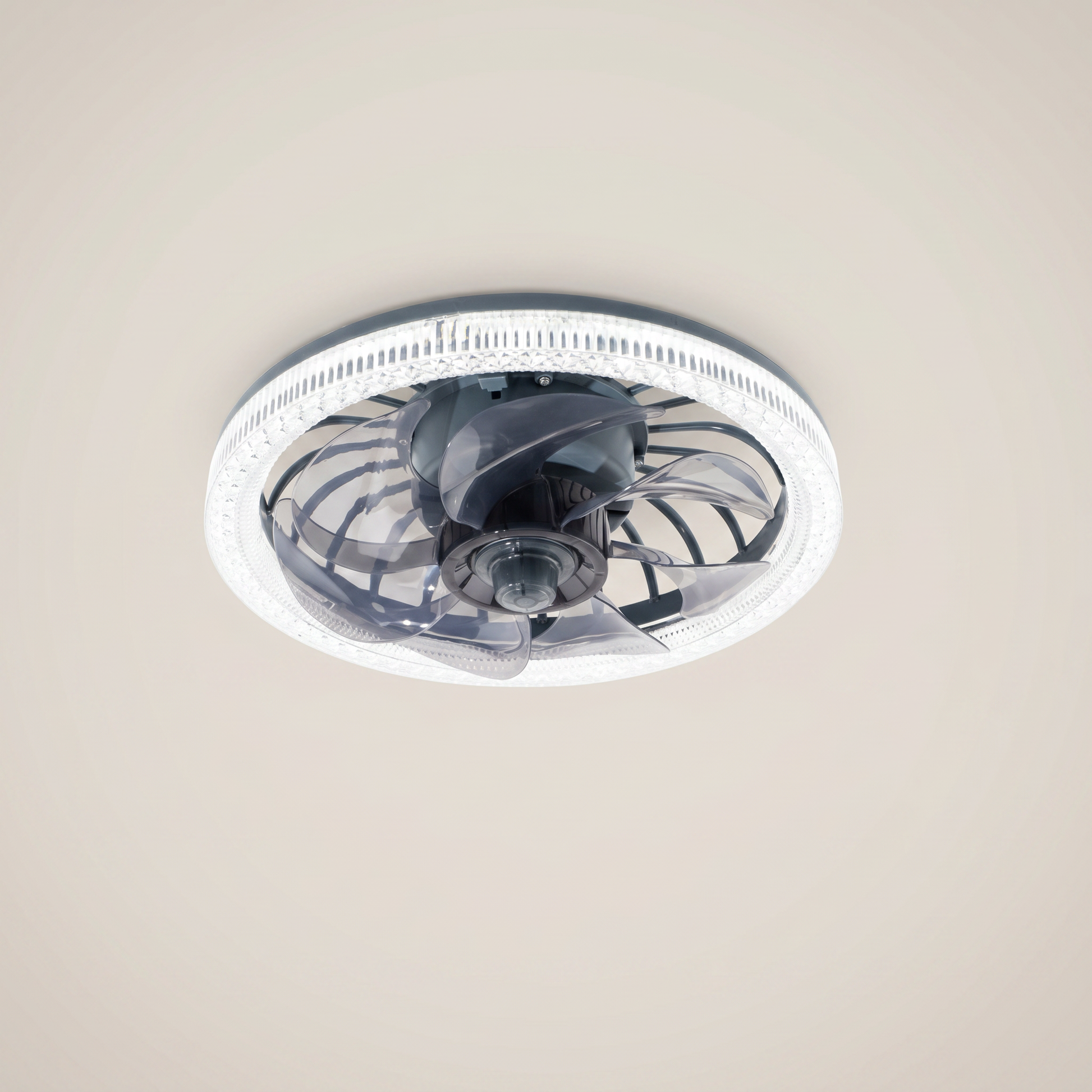 Dark green ABS round plastic fan blade ceiling fan light shown at three-quarter angle with LED lit and remote control visible