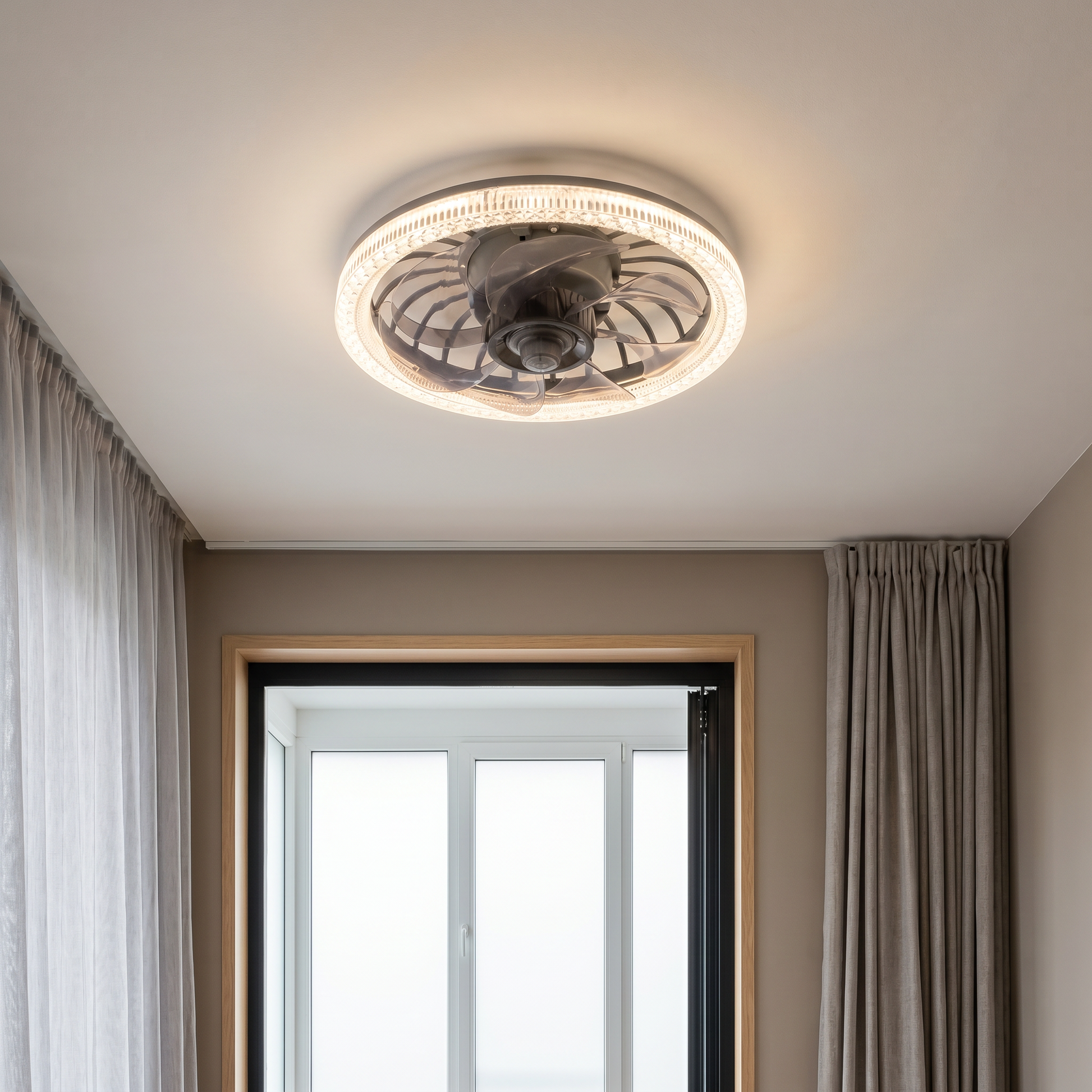 White ABS round plastic fan blade ceiling fan light shown side profile glowing with LED lit mounted on living room ceiling
