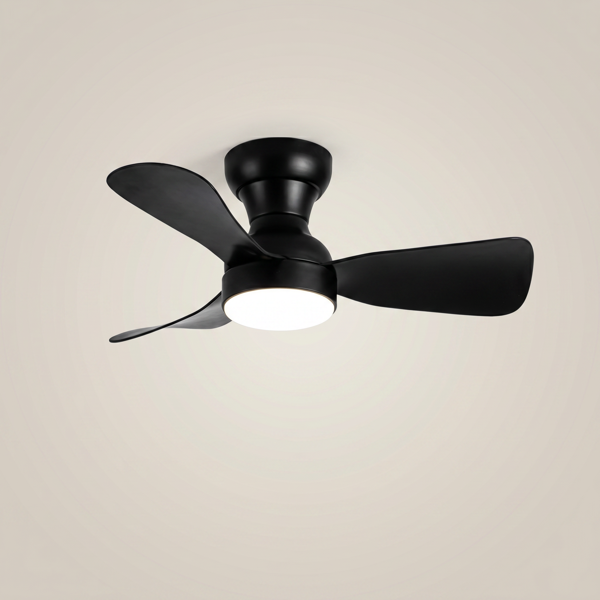 All black ABS flush mount ceiling light with fan shown at three-quarter angle lit with remote control