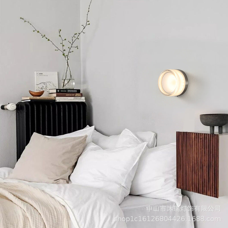 Detail shot close-up of Acrylic Smoke Gray Concave three-color dimming 1-light wall sconce showing smoke gray acrylic shade and brushed aluminum trim