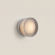 Acrylic Smoke Gray Concave three-color dimming 1-light wall sconce shown front view with brushed aluminum trim and smoke gray acrylic shade