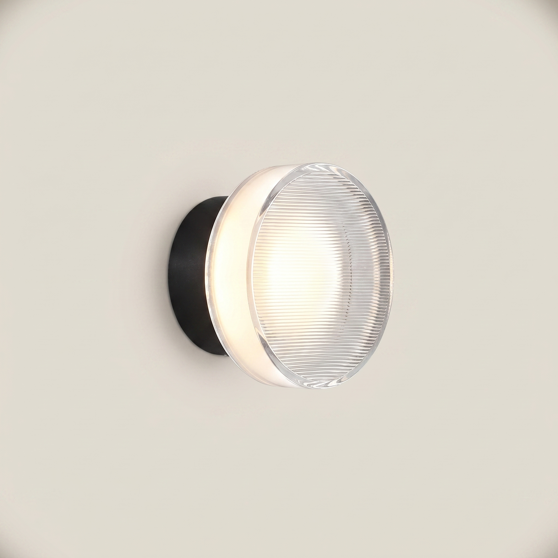 Three-quarter view of Acrylic Smoke Gray Concave three-color dimming 1-light wall sconce showing warm light, smoke gray acrylic, and brushed aluminum trim detail