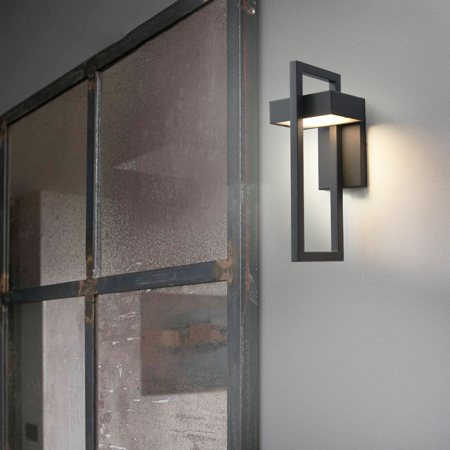 Close-up of aluminum alloy sand black rectangular Osram LED outdoor wall sconce showing matte black finish and double-layer milk white acrylic lampshade