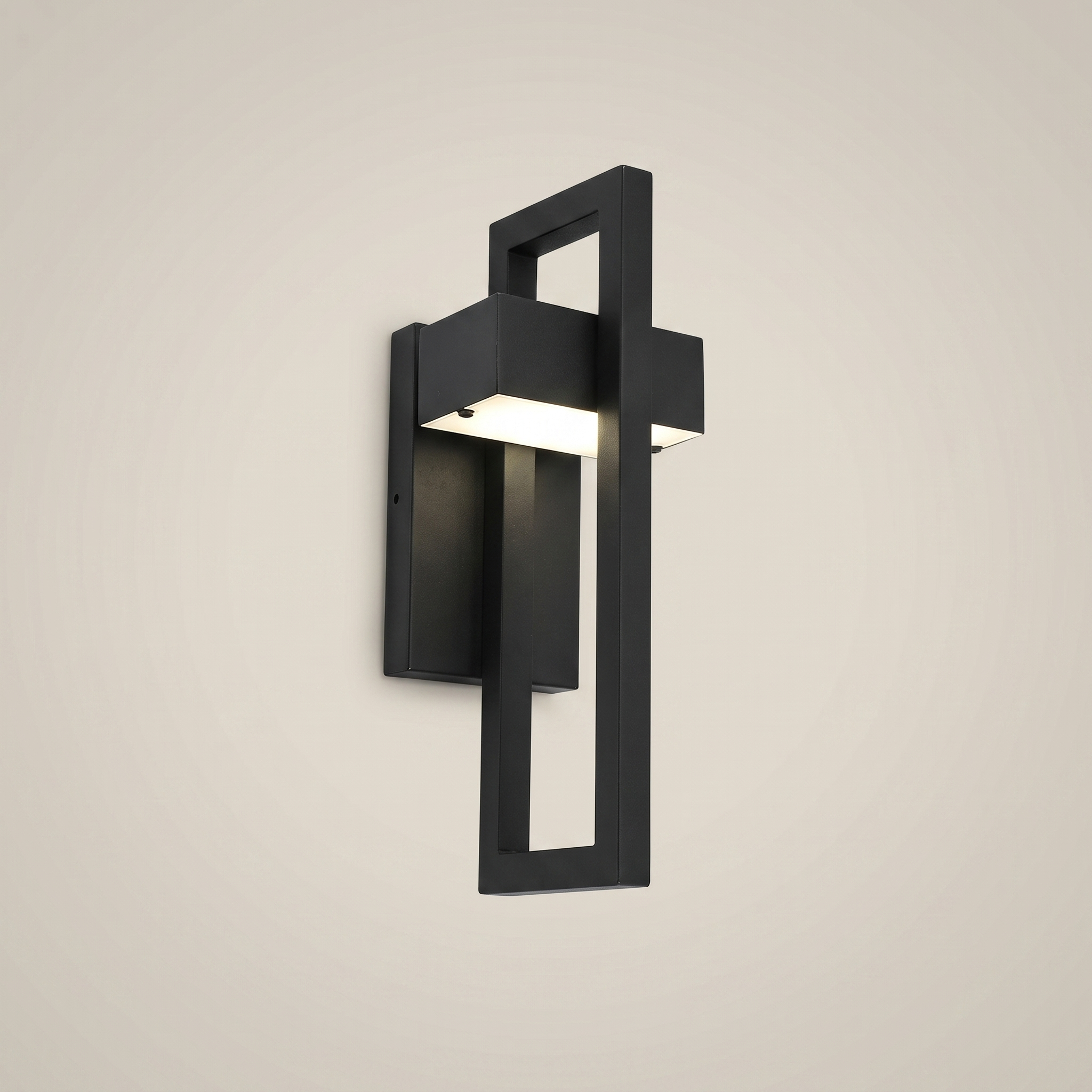 Side profile of aluminum alloy sand black rectangular Osram LED outdoor wall sconce illuminated with warm white light showing matte black finish