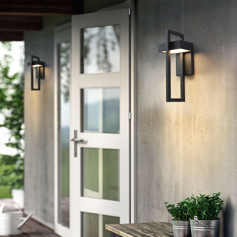Top-down detail shot of aluminum alloy sand black rectangular Osram LED outdoor wall sconce focusing on matte black finish and double-layer acrylic lampshade