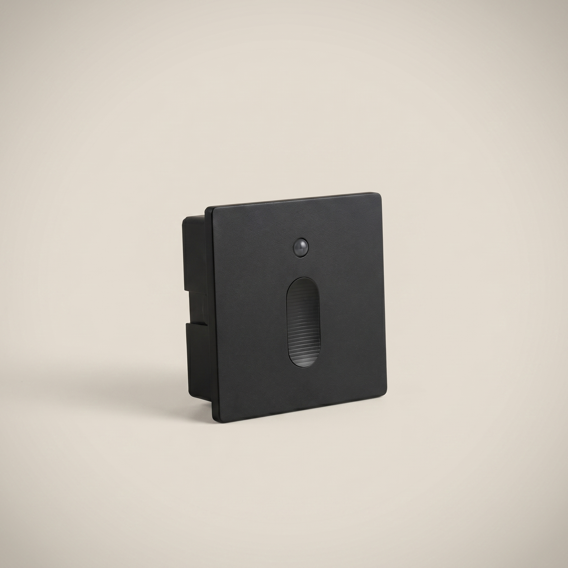Three-quarter angle of Aluminum Black 86-Type light plus motion sensor stair light showing black shell and sensor