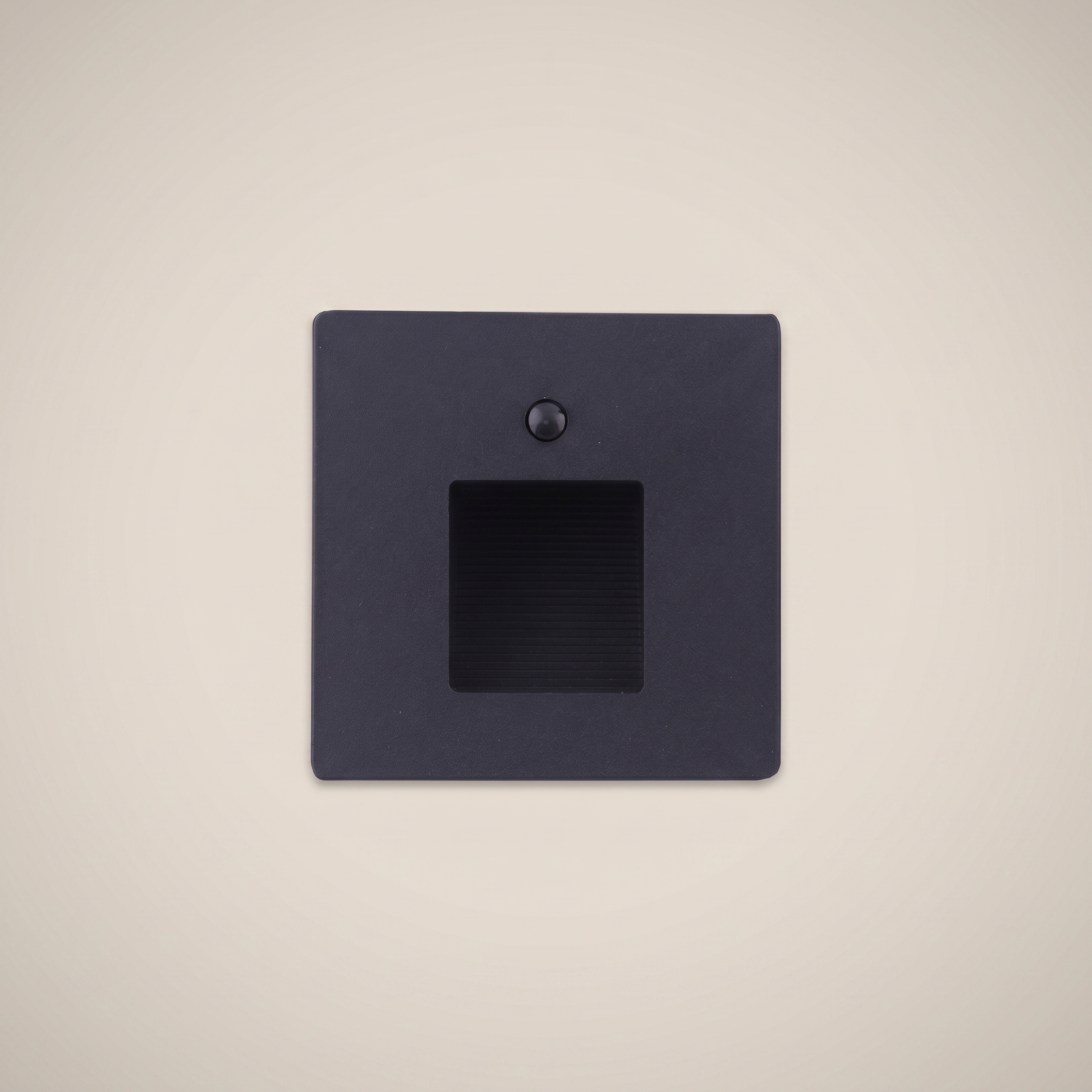 Top-down view of Aluminum Black 86-Type light plus motion sensor stair light showing black shell and LED chip