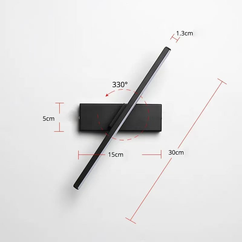 Close-up of aluminum black bar adjustable LED wall sconce in 30cm length with LED light lit