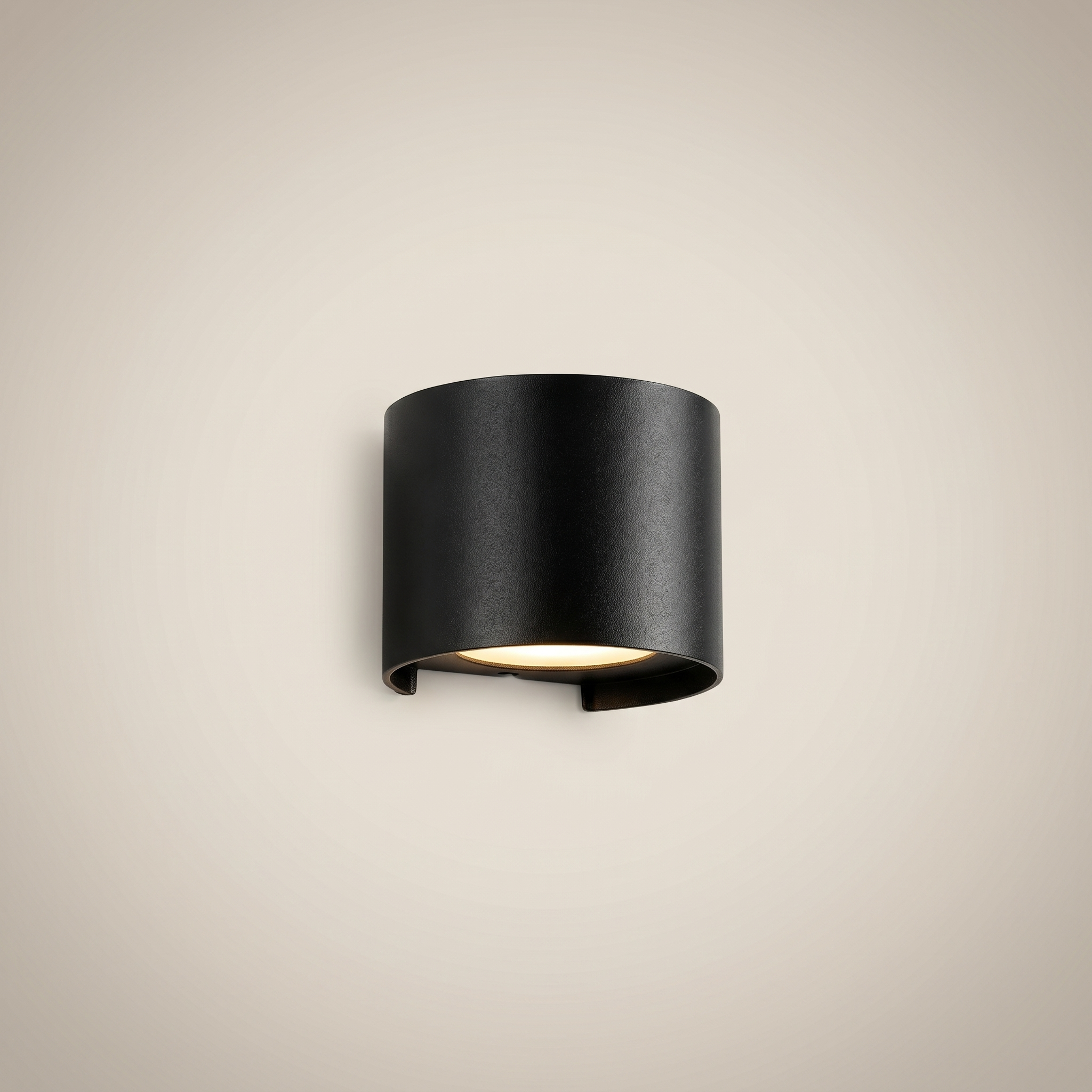 Close-up detail of black aluminum square outdoor wall sconce lit showing sealed IP65 waterproof design and dimmable light