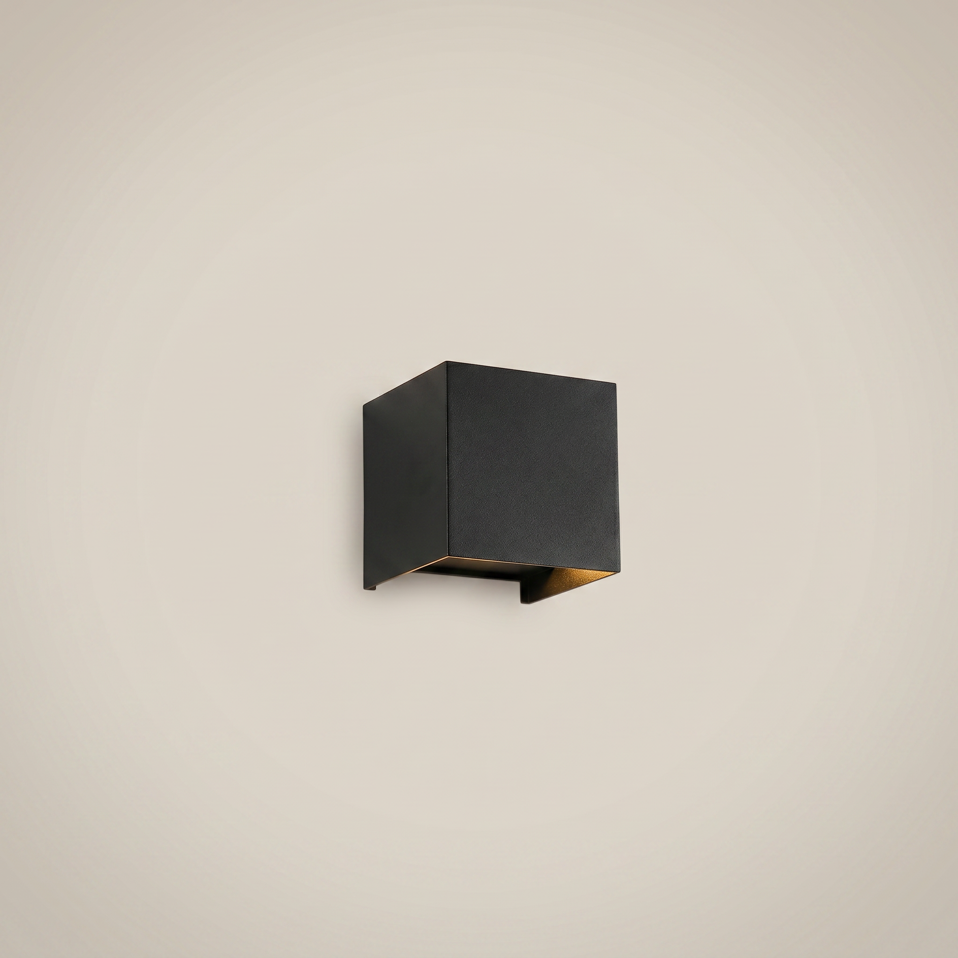 Top-down close-up of black aluminum square outdoor wall sconce lit showing high-brightness COB strip light source