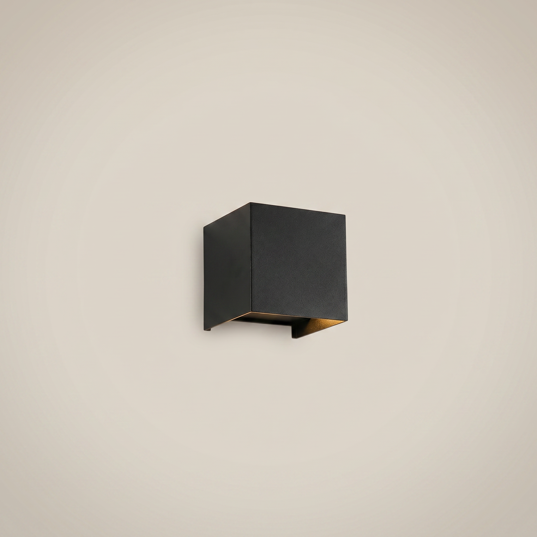 Top-down close-up of black aluminum square outdoor wall sconce lit showing high-brightness COB strip light source