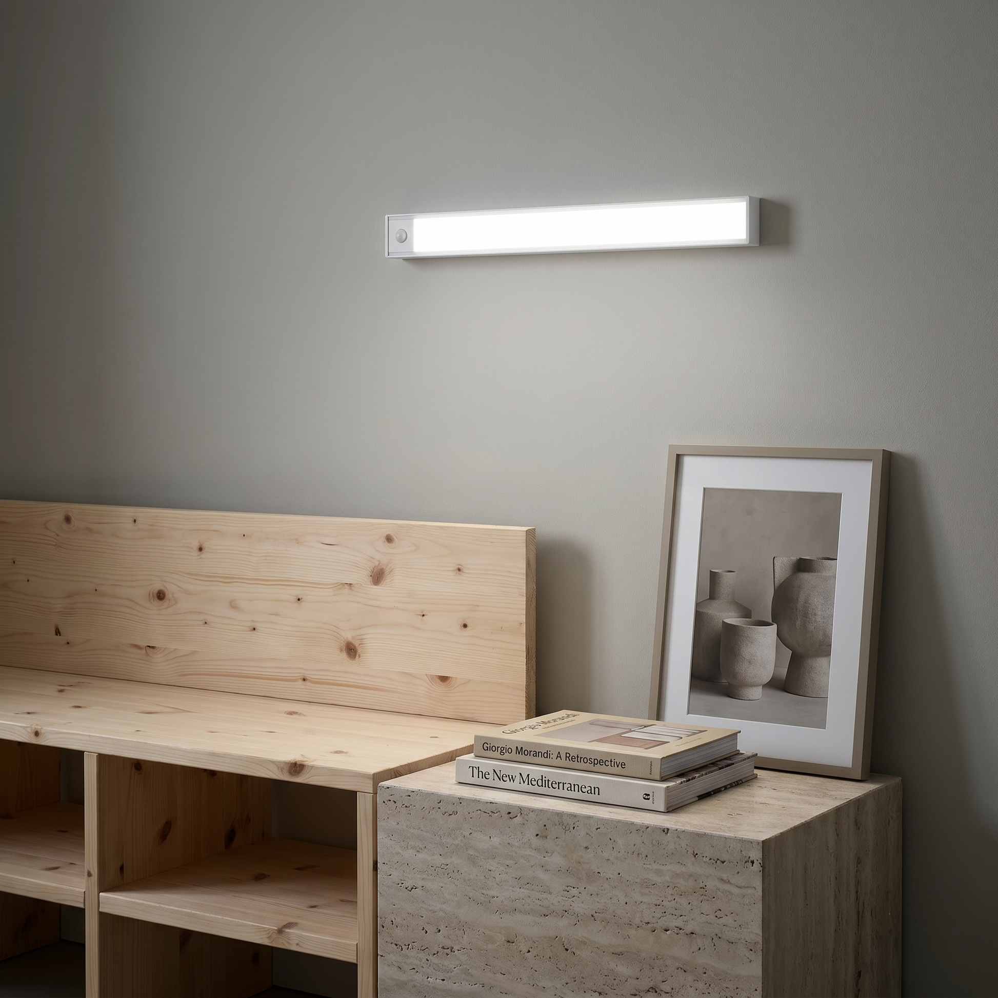 Aluminum silver linear motion sensor rechargeable under cabinet light top-down view unlit in ambient room showing slim design details