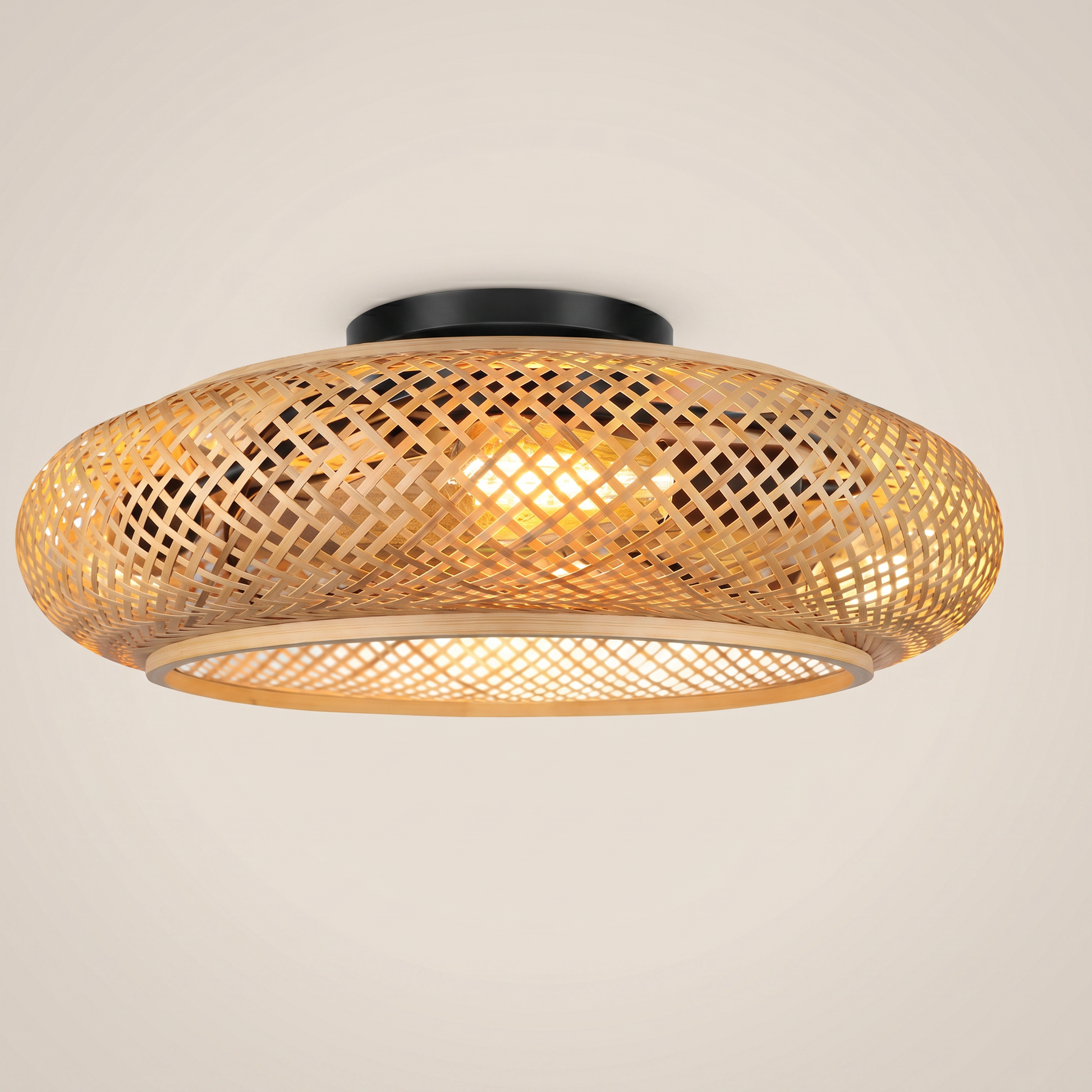 Style B bamboo oval remote control ceiling fan light shown at three-quarter angle with natural bamboo weave plastic blades and semi-flush canopy